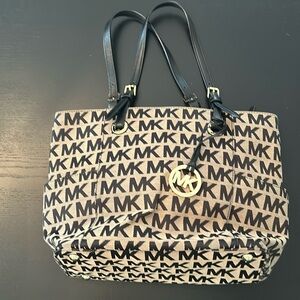 Michael Kors East West Black / Gold Signature Logo Purse with side pockets